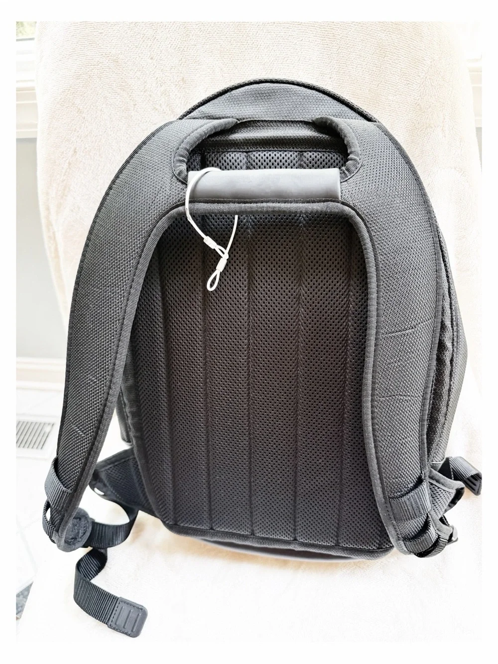 Tumi Black Backpack for Men or Women with Red Logo Accent